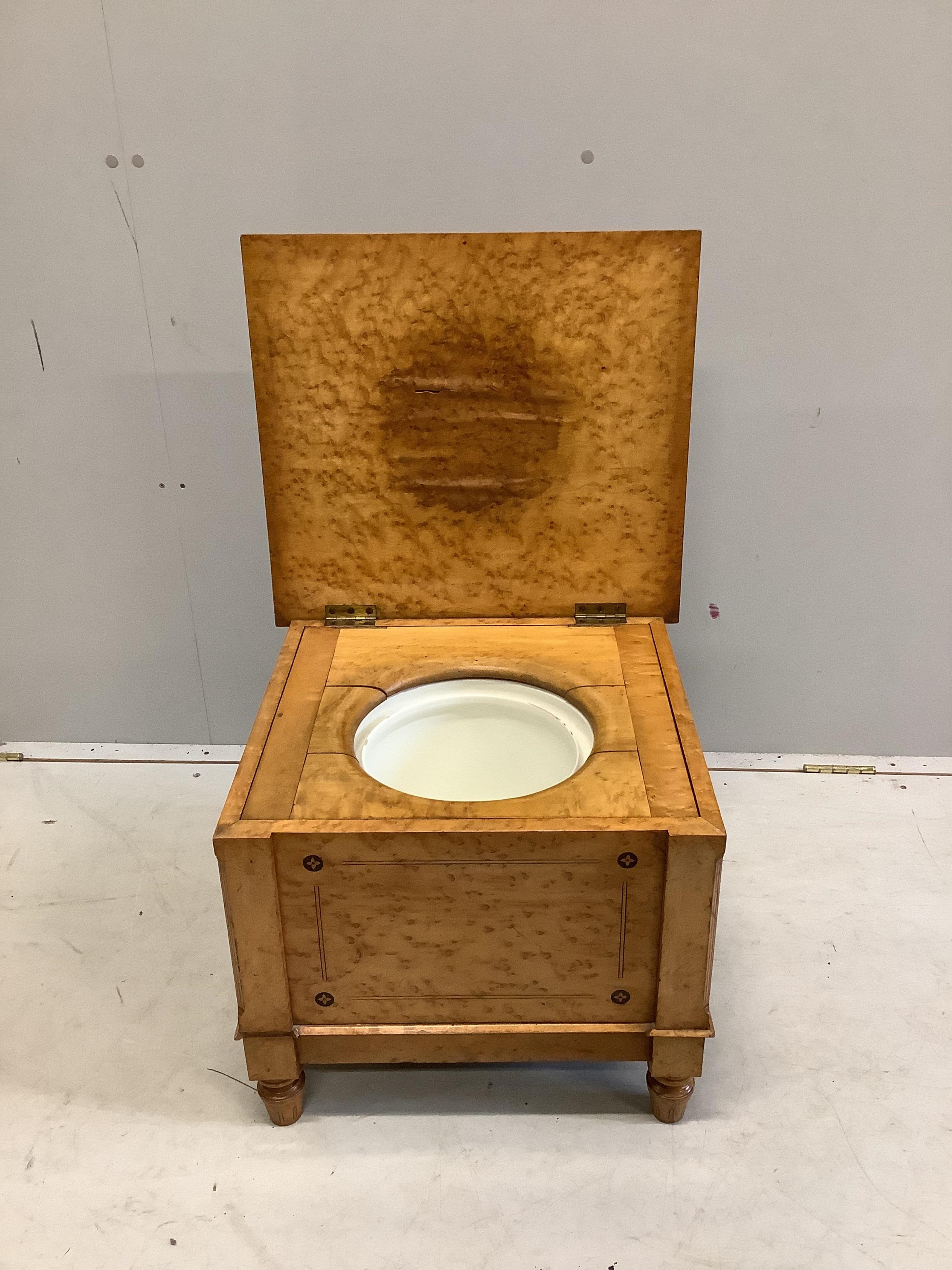 A late Victorian Gothic revival ebony inlaid, bird's eye maple bedroom suite, manner of Charles Bevan, comprising 5ft bed frame, kneehole dressing table, chest of drawers, marble top washstand, bedside cabinet, commode a